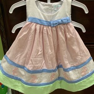 Pastel pink dress with embroidered Easter bunnies